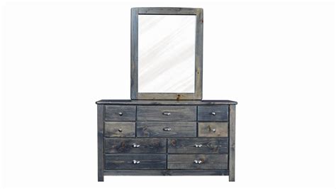 The rustic gray finish of this dresser creates a modern rustic look for your bedroom. Turkey Creek Rustic Gray Dresser and Mirror
