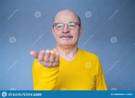 Senior Man Showing Something On His Palm Stock Image Image Of Think