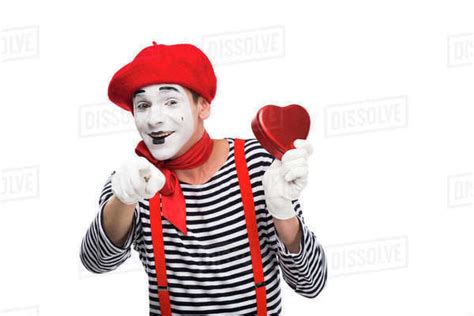 Mime Holding Heart Shaped T Box And Pointing On Camera Isolated On