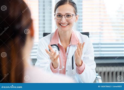 Young Female Doctor Seeing Woman Patient Stock Photo Image Of Medical