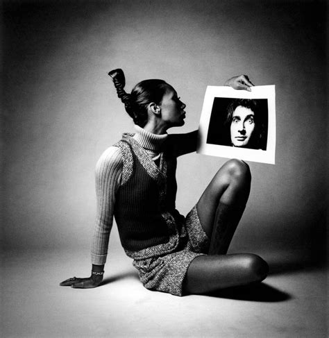 marisa berenson with portrait of jeanloup sieff photographed by sieff for british vogue london