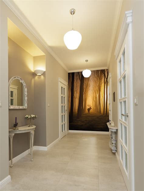 Wall sconces are winners with narrow hallways, while ceiling spotlights also cleverly keeps the area looking tidy. Wallpaper For Narrow Hallway | Tyres2c