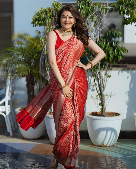 Pregnant Kajal Aggarwal Simply Glowed In A Red Silk Saree At Her Baby