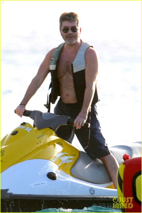simon cowell rides the waves while shirtless in barbados photo 3830109 shirtless simon