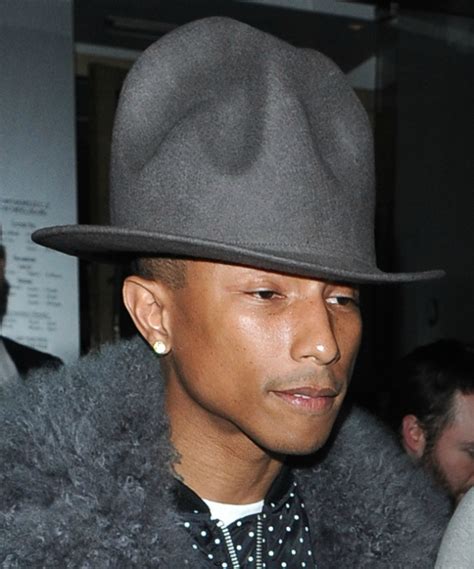 pharrell williams gets that hat in a new colour fashion news