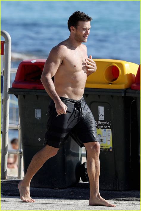 Scott Eastwood Bares His Buff Ripped Body On The Beach Photo