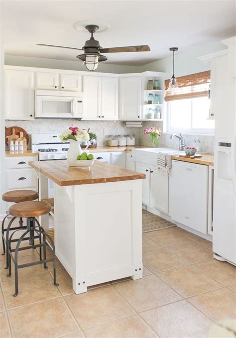 A small footprint and a serious smattering of eyesore features. Reveal and tour of a farmhouse style kitchen makeover on a ...