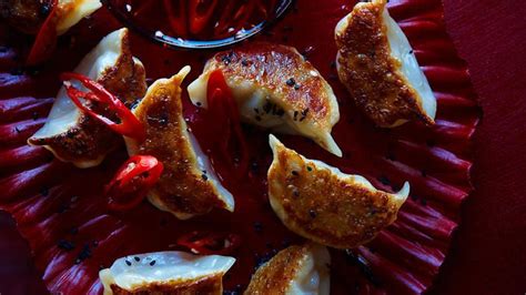 Pan Fried Pork And Chilli Dumplings With Chilli Infused Red Vinegar