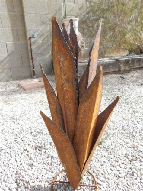 Check out our southwest yard art selection for the very best in unique or custom, handmade pieces from our this is a rustic hand crafted tin yard art flowers for western, country or southwest decor. Metal AGAVE 25" CACTUS landscape yard decor art Southwest ...