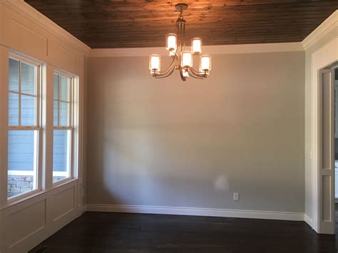 Dining Room With Bac Dark Oak Tongue And Groove Stained Wood Ceiling And Benjamin Moore White