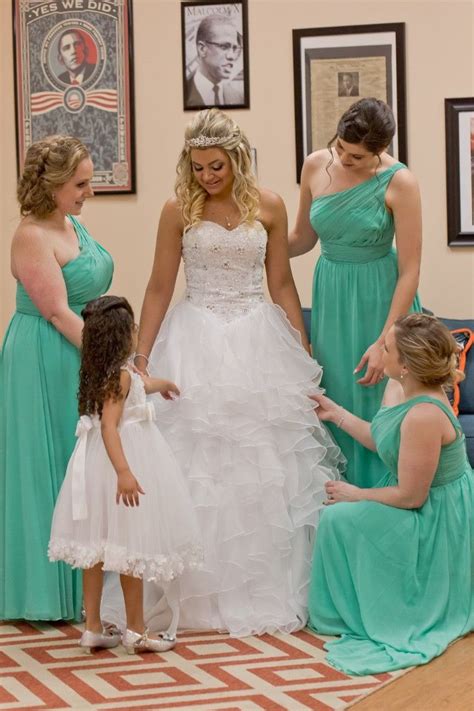 Bride Getting Ready Bridal Party Surrounding Bride For Final Touches