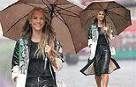 Vogue Williams Cuts A Stylish Figure Despite The Rain In A Patterned Trench