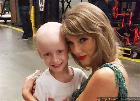 Taylor Swift Cuddles 6 Year Old Fan With Rare Cancer