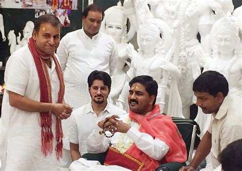 Two youngsters noticed a peculiar personality strongly built. Marble God Statues, Murti Makers, Suppliers in Jaipur, India