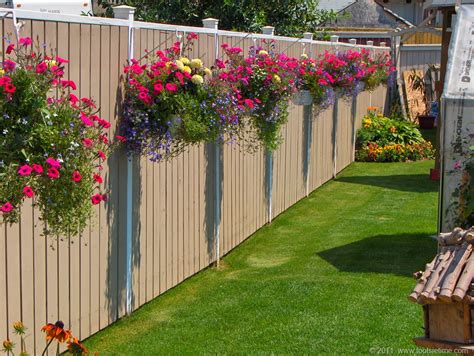 15 Fence Planters Thatll Have You Loving Your Privacy Fence Again