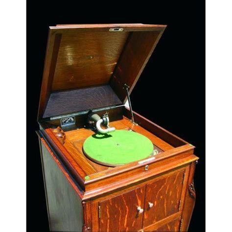This luxury record player cabinet is ideal for vinyl collectors or anyone who appreciates beautiful furniture. Victor Record Player Cabinet