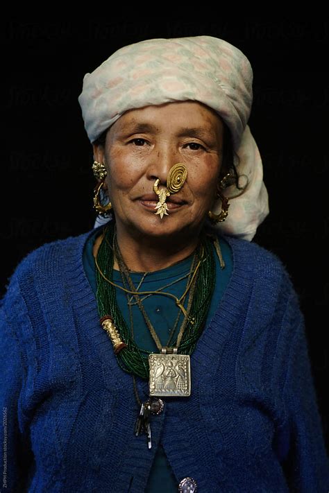 Portrait On Black Nepali Elderly Tamang Woman By Stocksy Contributor
