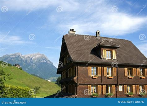 Swiss Wooden House In Alps Mountain Landscape Stock Photo Image Of