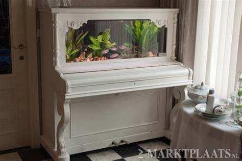 A big fish tank will not be recommended if you have a small room where you want to keep your fish tank. Old Piano Upcycled Into Aquarium • Recyclart