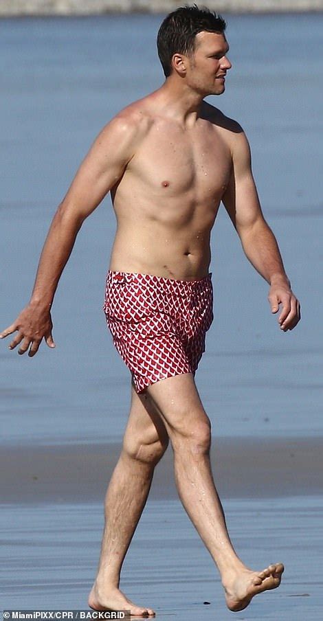 Tom Brady Flaunts Athletic Bod As He Frolics Shirtless On The Beach