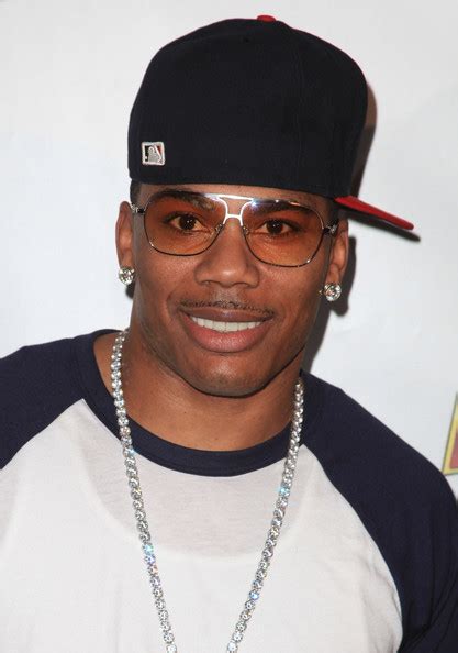 Nelly Aviator Sunglasses Nelly Looks Stylebistro