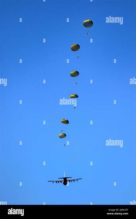 Military Parachutist Paratroopers Parachute Jumping Out Of A Air Force