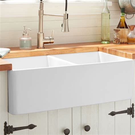 One of the oldest and most popular types of kitchen sink is a farmhouse sink. Signature Hardware 393672 33" Reinhard Double-Bowl ...