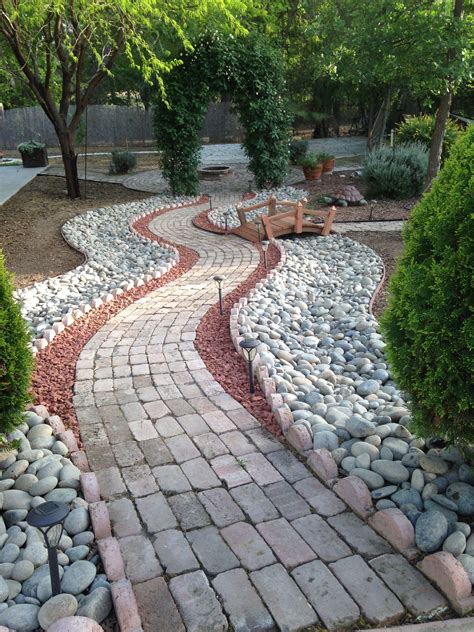Added Rock To Our Brick Walkway Backyard Landscaping Designs