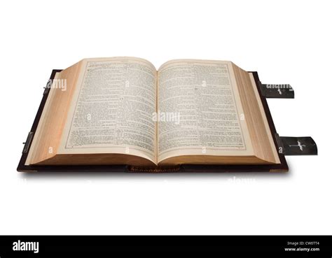 A Very Ornate And Large Holy Bible Opened Flat On A White Background