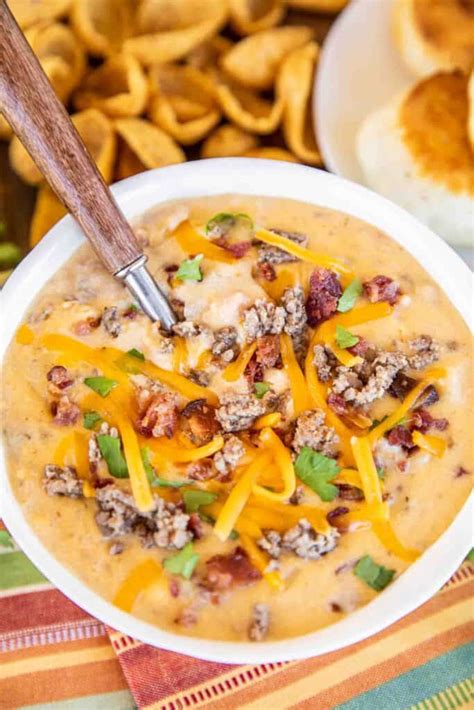 Cheeseburger soup is a delicious bowl of comfort food that is easy to make in 30 minutes! Slow Cooker Bacon Cheeseburger Soup - Plain Chicken