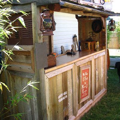 Last summer, my husband built a little tiki hut beside. How to Build a Backyard Tiki Bar | Backyard bar, Tiki bar ...