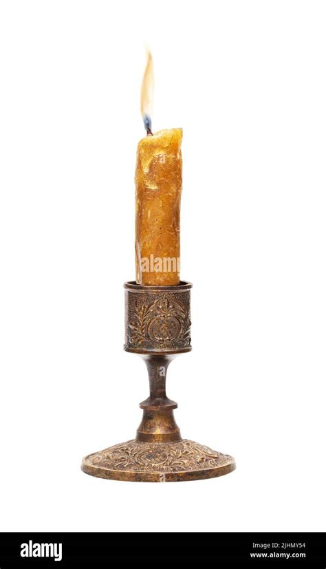 Burning Old Candle Vintage Bronze Candlestick Isolated On White