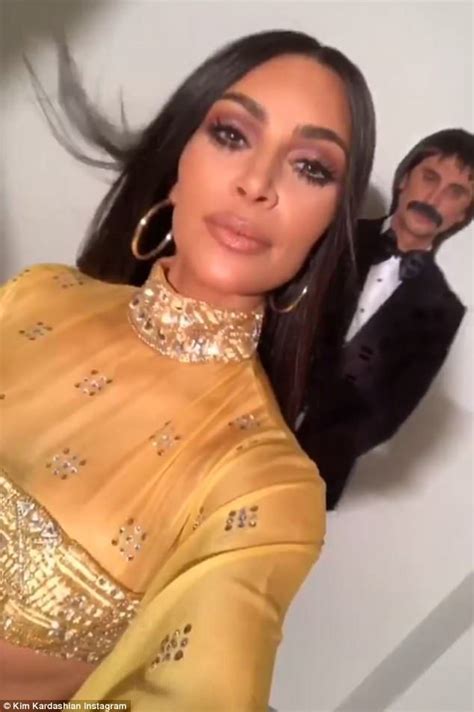 Kim Kardashian And Jonathan Chaben Dress As Sonny And Cher Kim