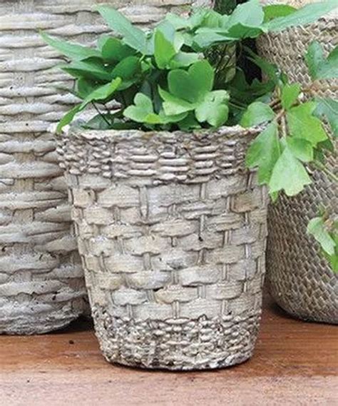 Original diy pots in the garden made of cement and old clothes in 2020