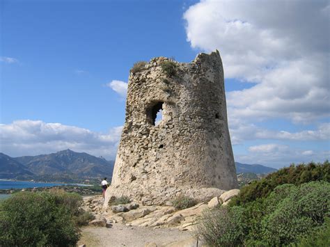 Regular buses can also bring you to the town in just over 1 hour. Ancient tower in the resort of Villasimius, Italy ...