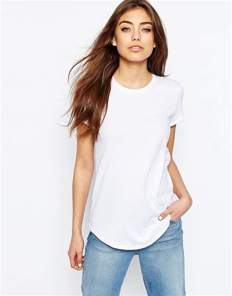 If the day is warm enough for a jacket but not cold enough for a sweater, then buy a white shirt in a thicker material and layer it over your top. 10 Cozy White Plain T-Shirts for Fashionable Women ...