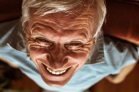 Closeup Of Senior Man Face Toothy Laugh Stock Image Colourbox