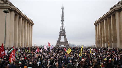 Tens Of Thousands Of Protesters Across France Call On Macron Not To