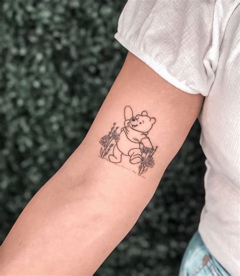 Fine Line Pooh Bear Tattoo On The Inner Arm