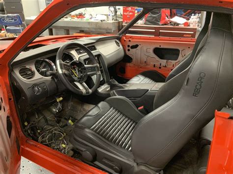 1969 Ford Mustang Coupe Orange RWD Manual Fastback restomod coyote swap