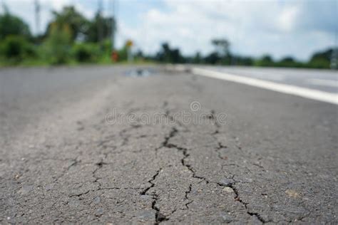 Damaged Cracks In The Road Dangerous For Traffic Stock Image Image Of