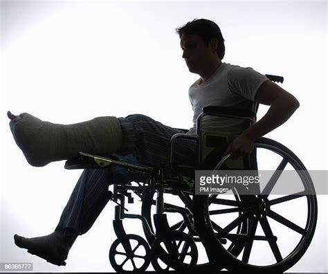 Leg Cast Wheelchair Stock Fotos Und Bilder Getty Images