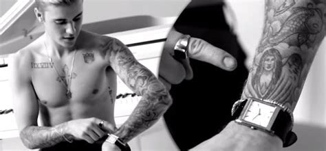 WATCH Justin Bieber Awkwardly Shows Off His Selena Gomez Tattoo