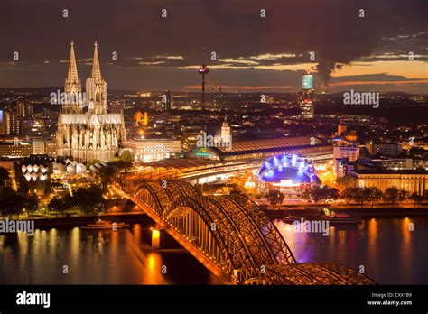 City View Of Cologne At Night With Cologne Cathedral Rhine River