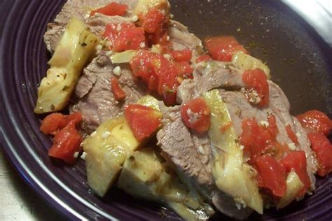 Roast Lamb With Tomatoes And Artichoke Hearts Recipe