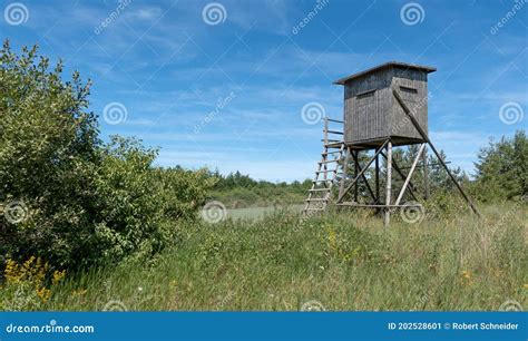 Enclosed Deer Stand On A Wild Meadow With Bushes Stock Image Image Of