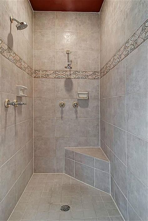 Rainfall shower heads may seem like a luxury. Oversized, doorless walk-in shower with two shower heads ...