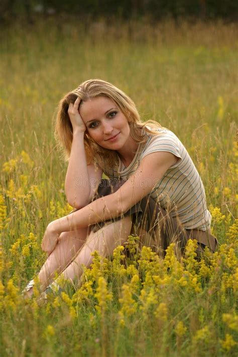 Country Girl Sitting In The Grass Stock Photo Image Of Beautiful
