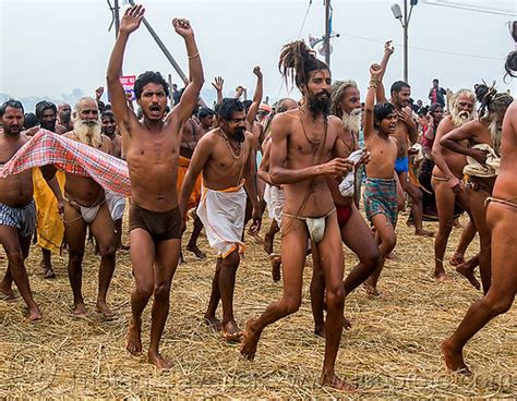 Hindu Devotees Running After Holy Dip In Ganges River Kumbh Mela India