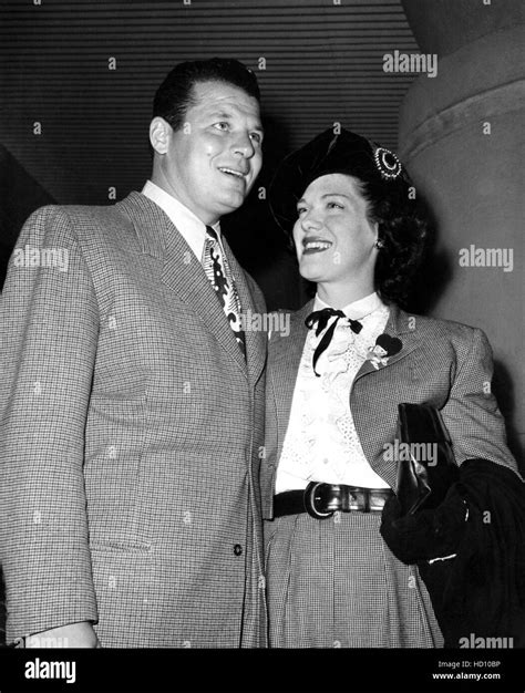 from left jack carson with second wife kay st germain wells at ice follies opening ca